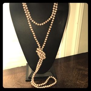 72” continuous genuine freshwater pearl necklace in pale pink.